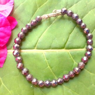 Hematite Faceted Bead Bracelet. Known for its ability to break through mental and emotional barriers.