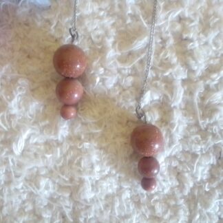 Mystic assorted goldstone pendulums available.