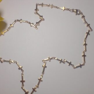 Gold Plated Stainless Steel Cross Chain Necklace - 45cm offers a luxurious finish that mimics the beauty of real gold.