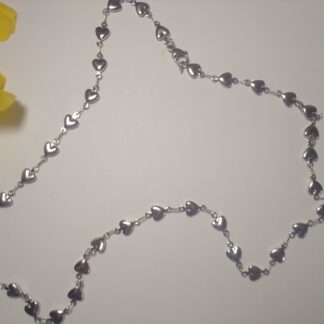 Stainless Steel Crosses Chain Necklace featuring a series of heart charms linked together, 45cm in length.