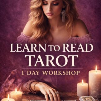 Tarot cards laid out in a tarot spread during a Learn to Read Tarot workshop.